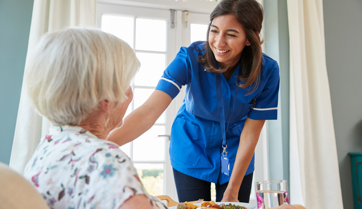 Carer with elder resident